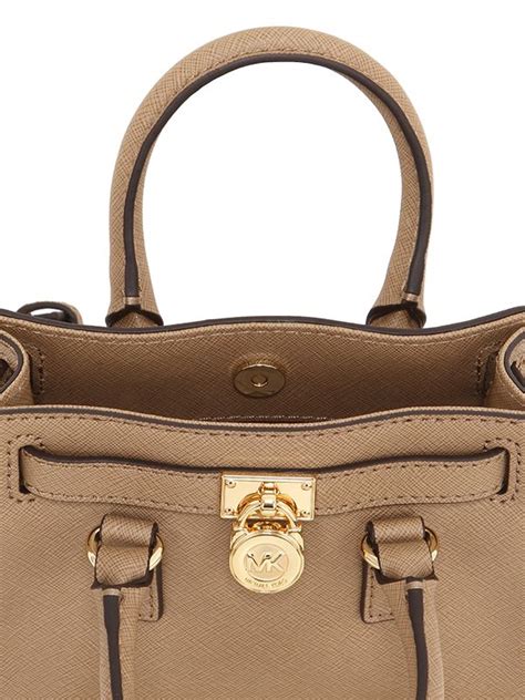 does michael kors have warranty on purses|Michael Kors refund.